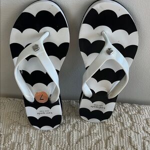 Women’s Kate Spade flip flops. Size 7